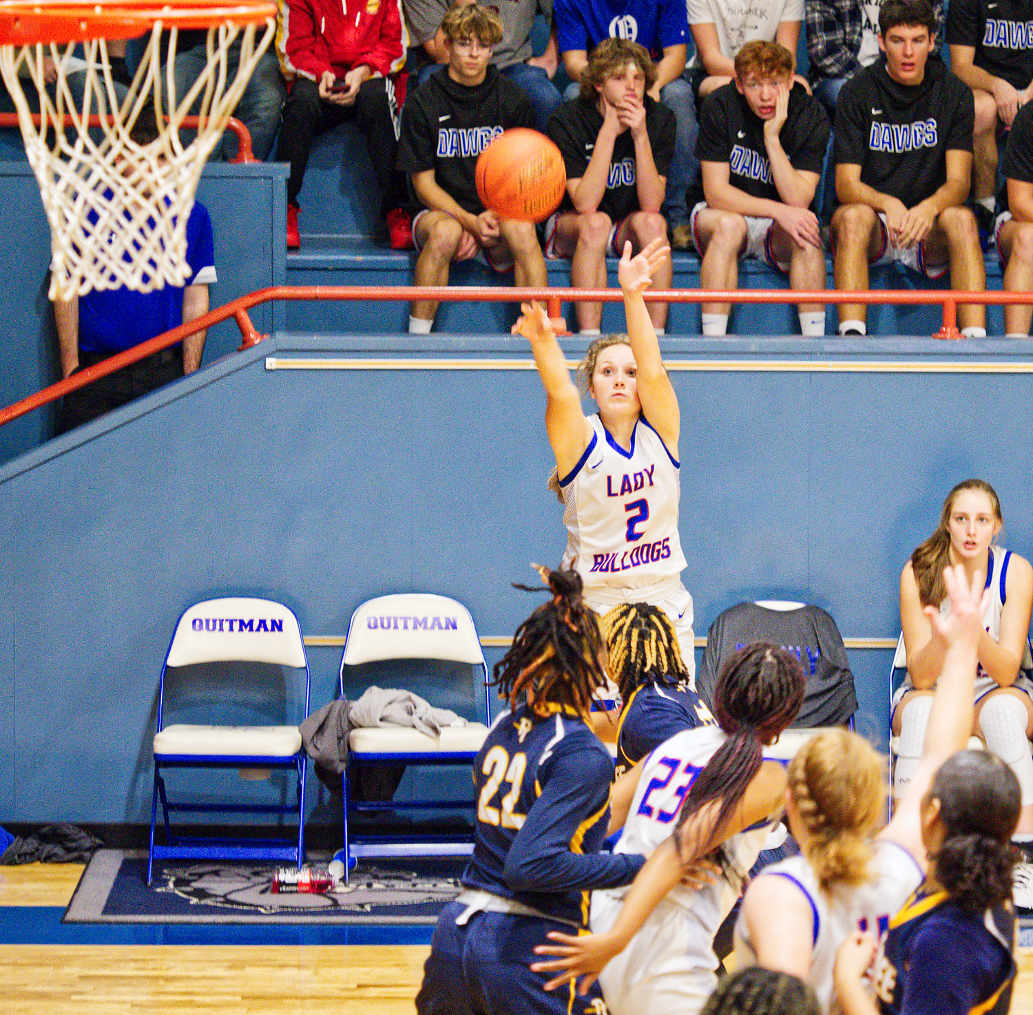 Carley Spears knocks down a three point shot against Pine Tree. [see more holiday hoops]